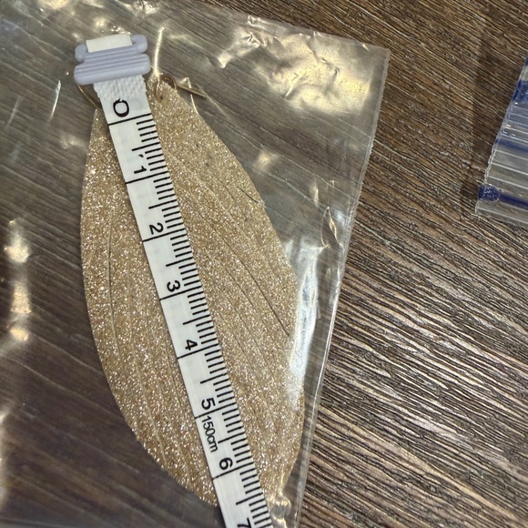 Elegant Gold Leaf Earrings - Picture 5 of 6